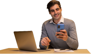 Person checking phone with laptop